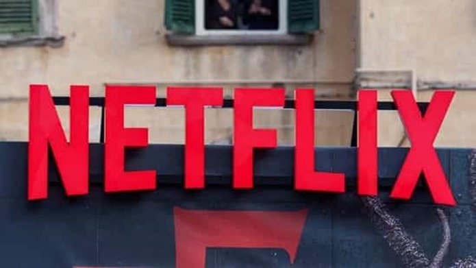 netflix to buy warner bros
